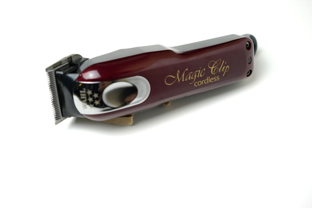 MACHINE CUT PROFESSIONAL WAHL MAGIC CLIP, BLADE FADES.